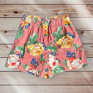 URBAN OUTFITTERS Women’s High Elastic Waist Tropical Print Shorts in Coral